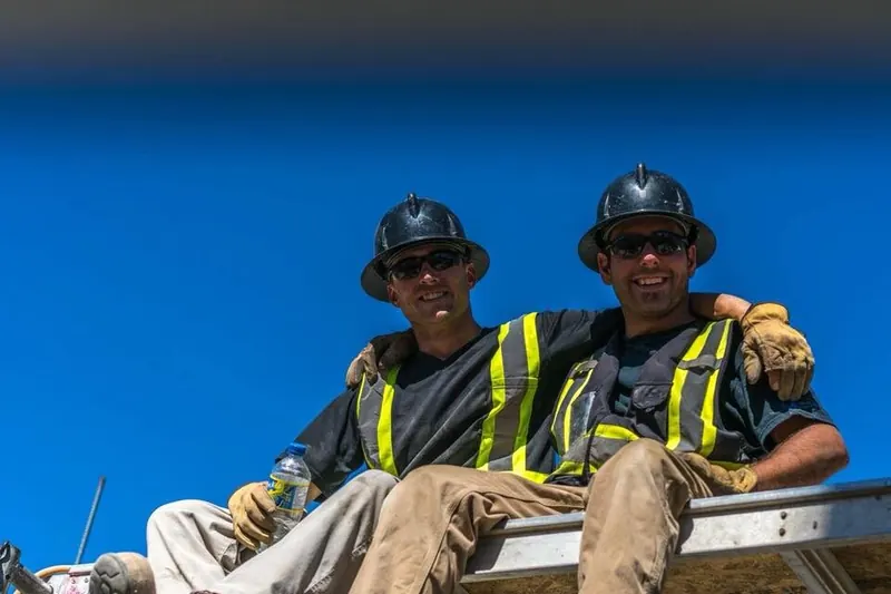 Cooper and Mark on a job site