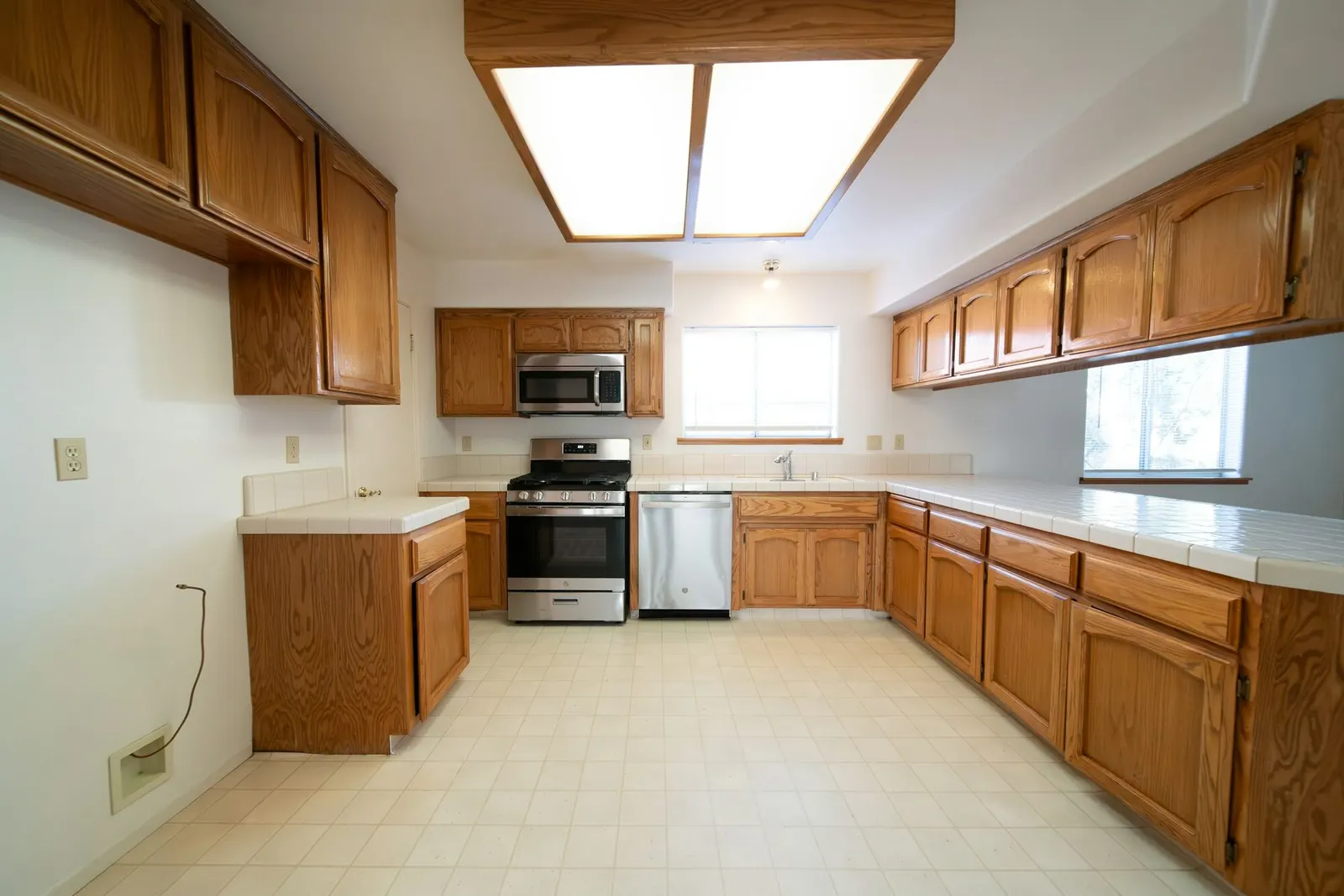 A dated oak kitchen before renovation