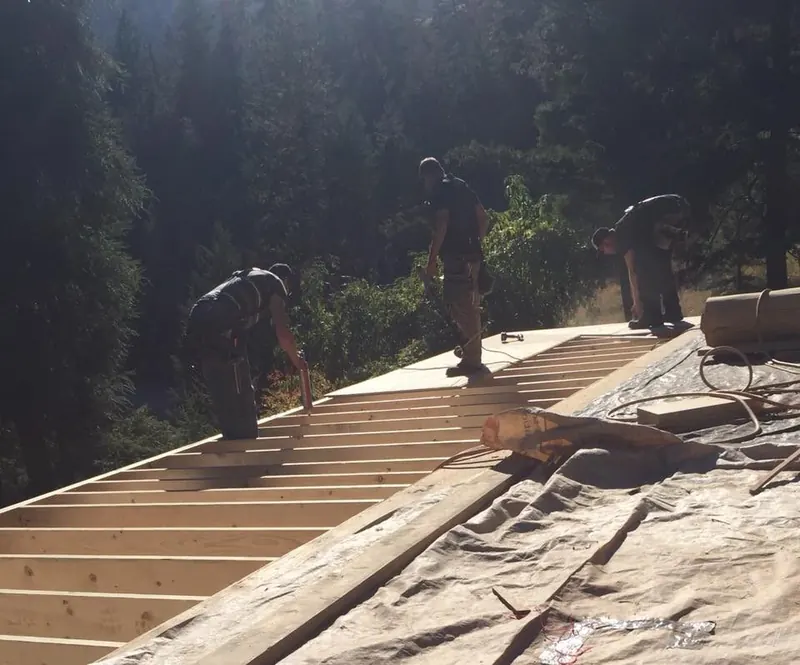 Comark crew working on a roof deck